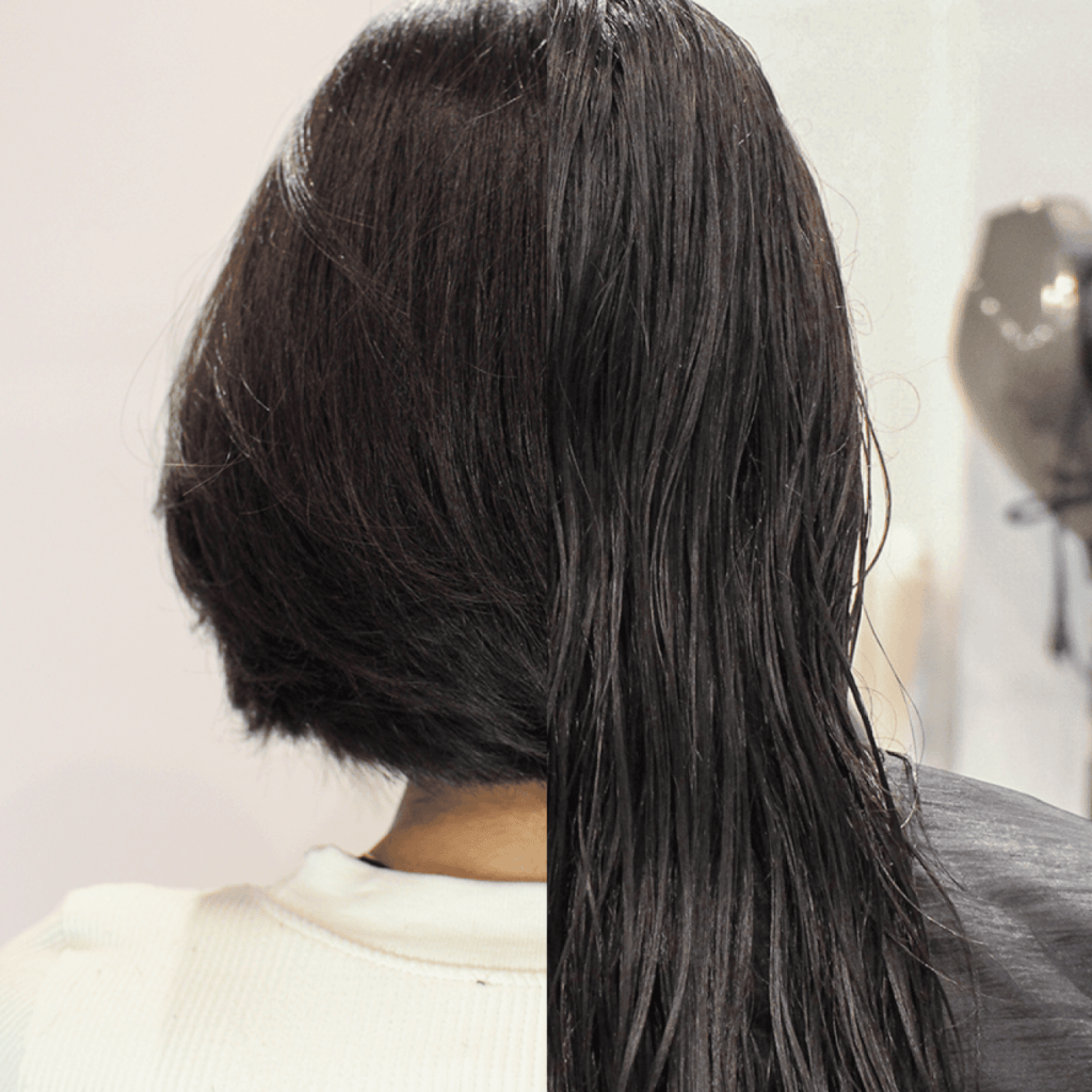 a person has a short layered bob haircut